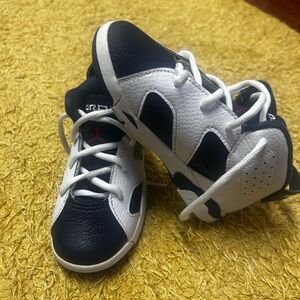 Jordan 6s. Navy blue , white and red.